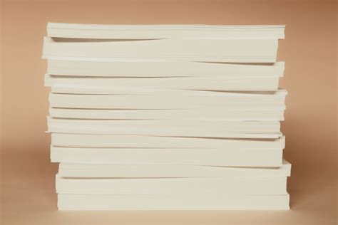 How Many Pages Are in a Ream of Paper: A Journey Through the Tangled Web of Paper and Imagination